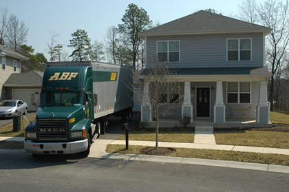 ABF moving trailer parked in the driveway of the Maryland house