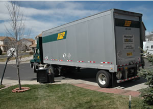 The ABF trailer backing into the driveway at the new house in Colorado