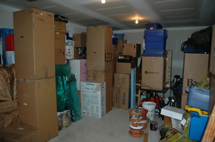 Packed boxes staged in the garage ahead of loading day