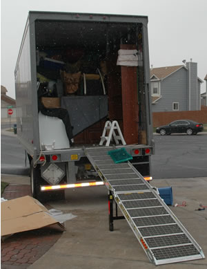 Light snow falling as the trailer is unloaded