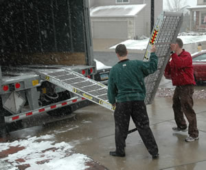 Folding up the loading ramp after unloading in Colorado